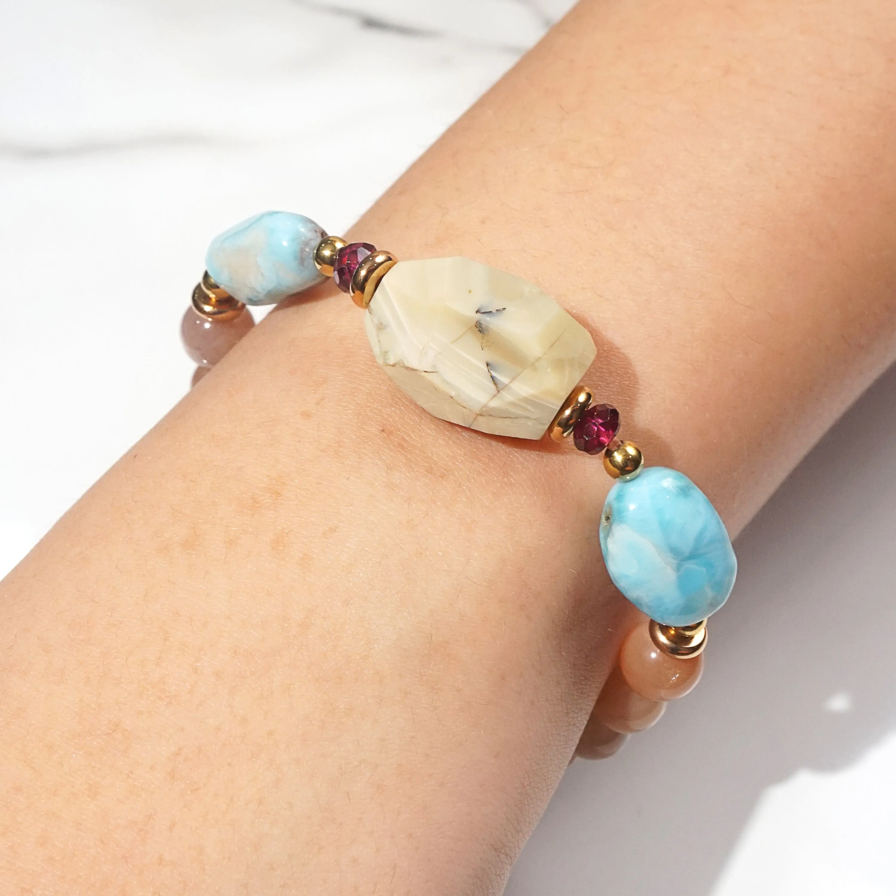Ivory Opal, Peach Moonstone, Larimar, and Garnet