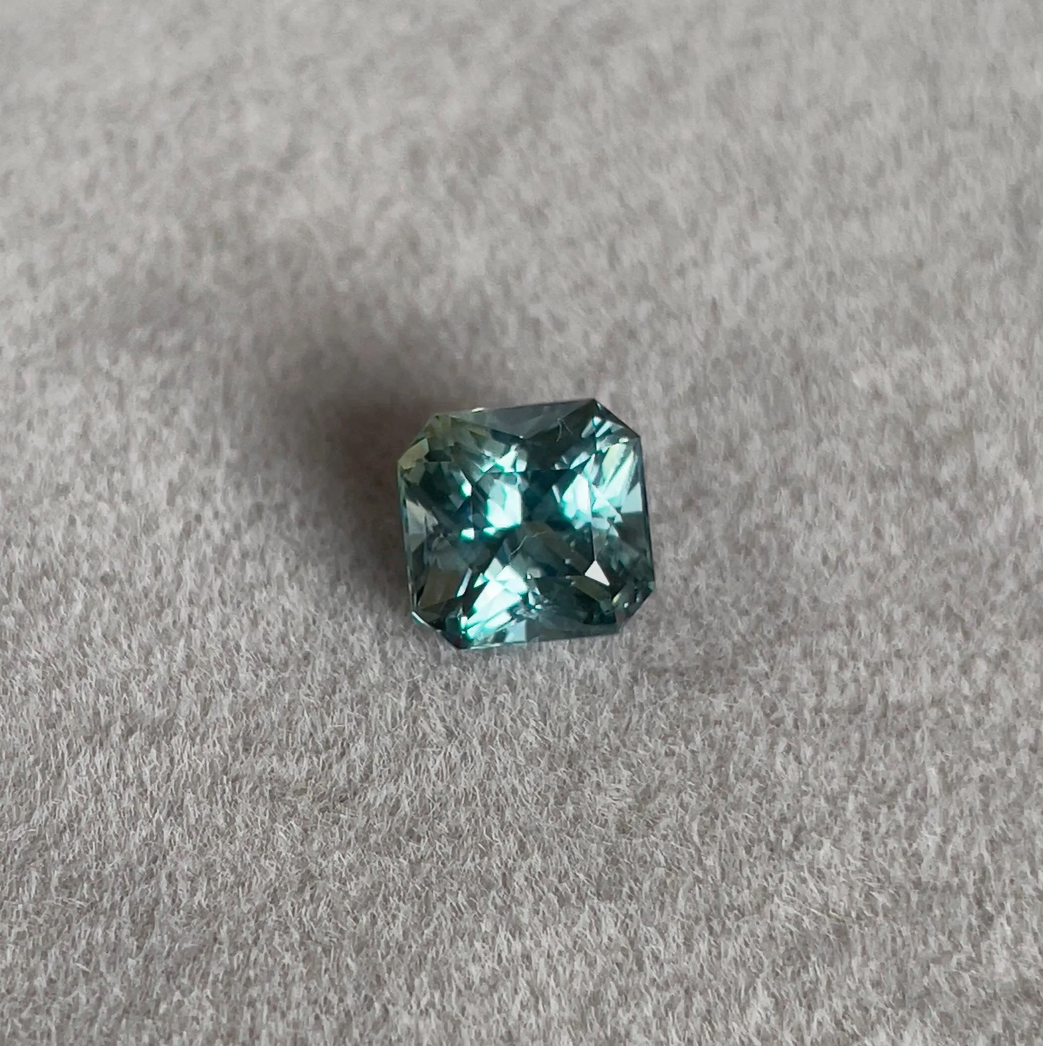This 2.21 carat Green Sapphire is well cut to bring out the best colour and luster, and has a perfect colour blend.