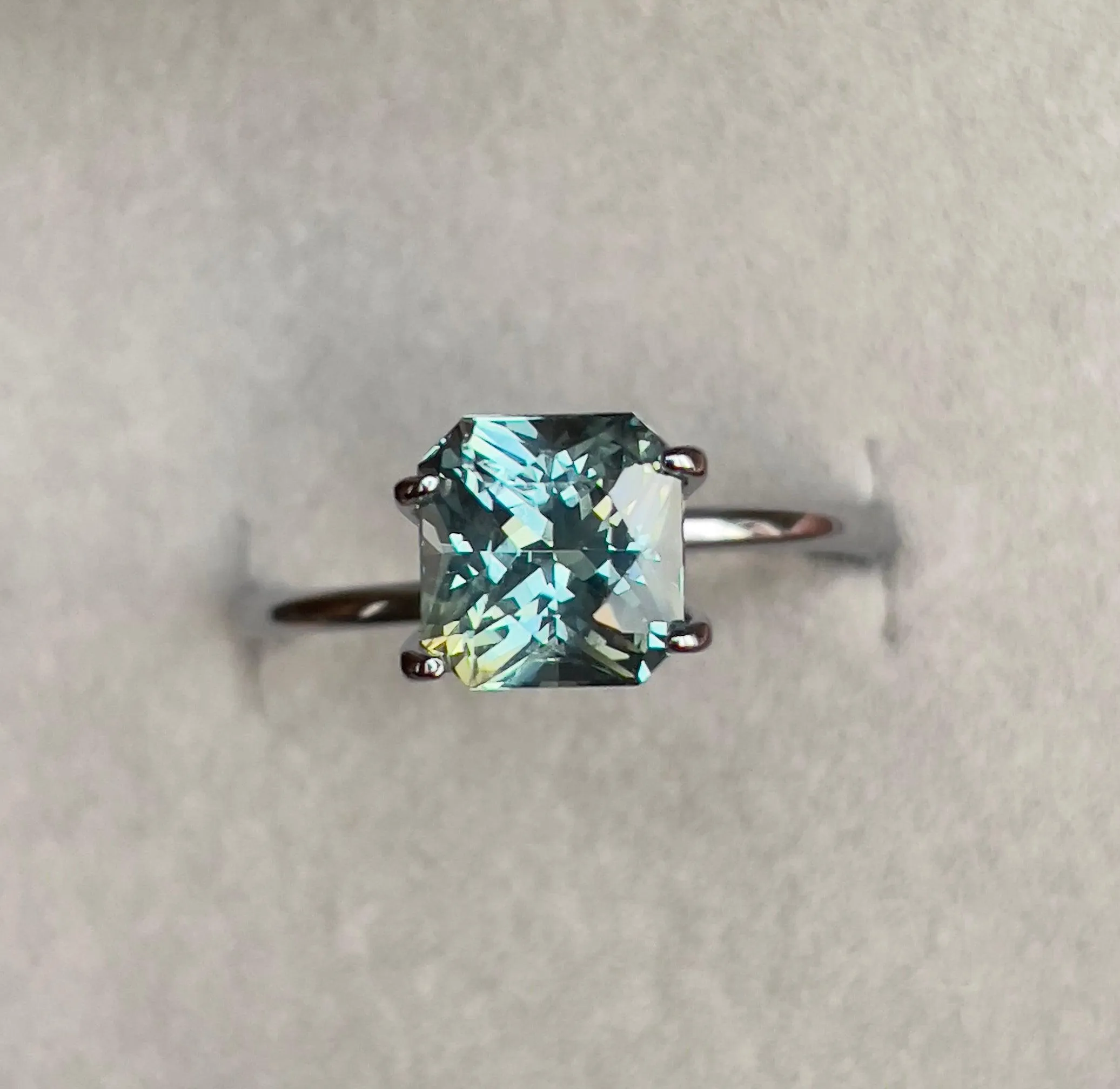 This 2.21 carat Green Sapphire is well cut to bring out the best colour and luster, and has a perfect colour blend.